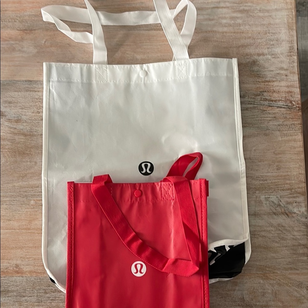lululemon athletica White and Red Tote Bags